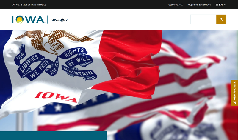 Homepage of Iowa.gov featuring the Iowa state flag with the motto ‘Our liberties we prize and our rights we will maintain,’ symbolizing the official State of Iowa government website