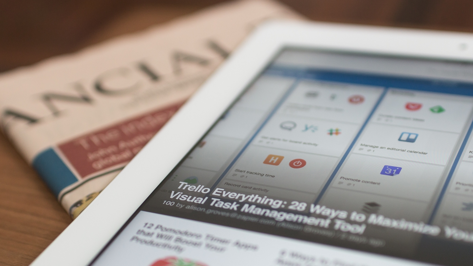Ipad on top of a newspaper Ipad on top of a newspaper
